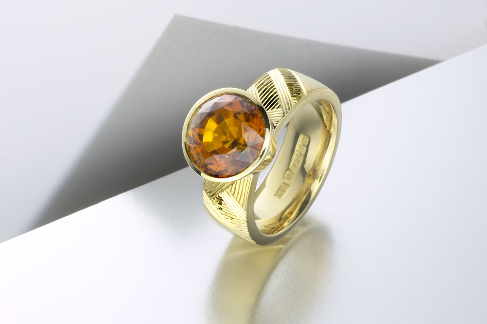 18ct yellow gold, hand engraved, brown/green tourmaline. Photo: Paul Hartley