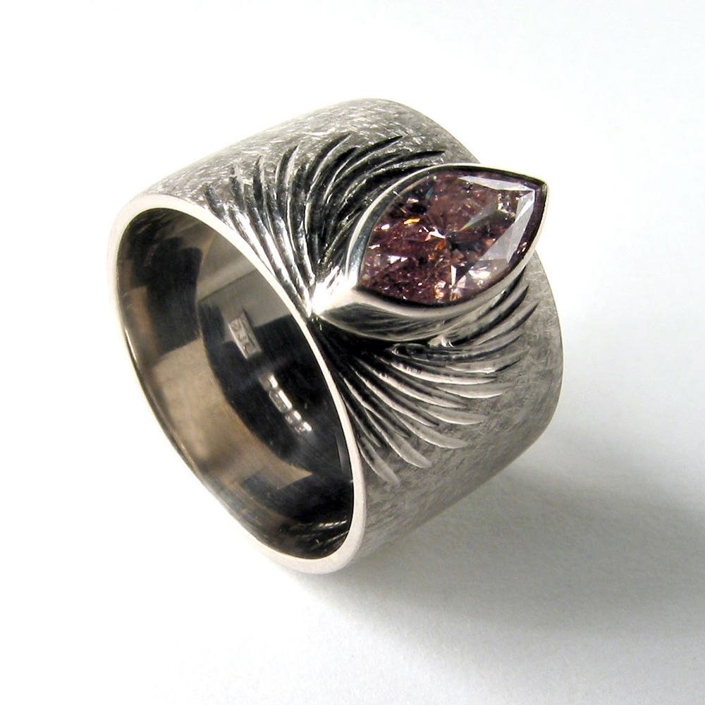 18ct white gold, hand engraved, pink marquise diamond.
