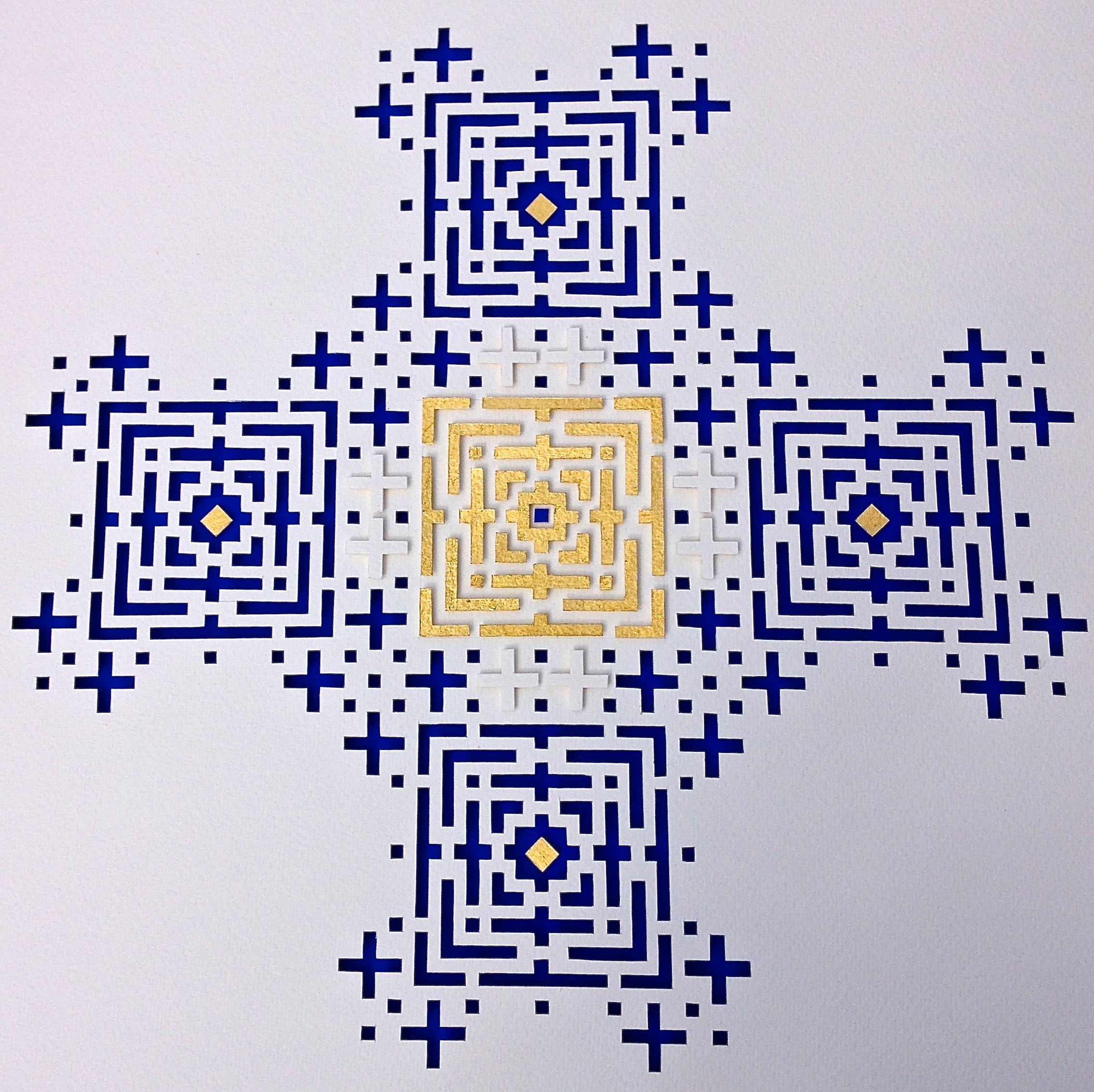 White handmade paper, cobalt blue mount board, gold leaf. 63cm x 83cm.This large piece is part laser cut, part hand cut. In daylight the cuts and raised parts throw shadows; in candlelight it is more ancient and mysterious.