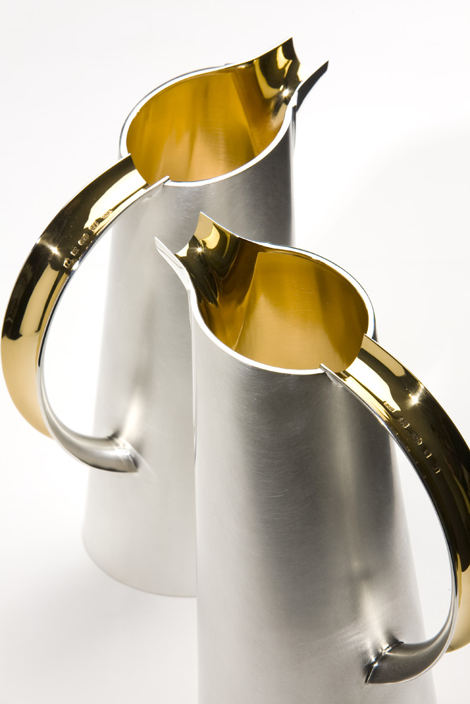 <a href="/jewellery/pair-water-jugs-2008-silver-giding-capacity-125-litres-photo-simon-armitt">PAIR OF WATER JUGS, 2008. Silver, giding. Capacity 1.25 litres. Photo: Simon Armitt</a>