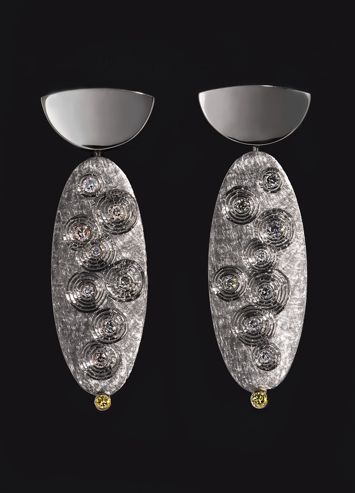 18ct white gold, set with grey diamonds and small pair yellow diamonds. 2008. To match Golden Thread brooch.Photo: Simon Armitt