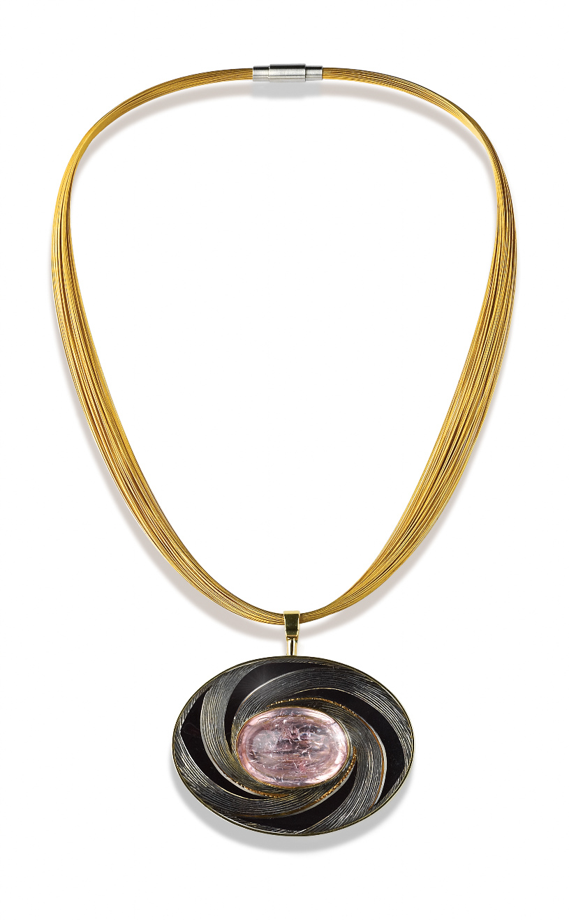 Silver, hand carved and engraved, part gilded, part black rhodium plated. Pink oval cabouchon tourmaline,Chain 22ct gold plated, stainless steel wires. 6 cm x 4 cm. 2013.Photo: Simon B Armitt