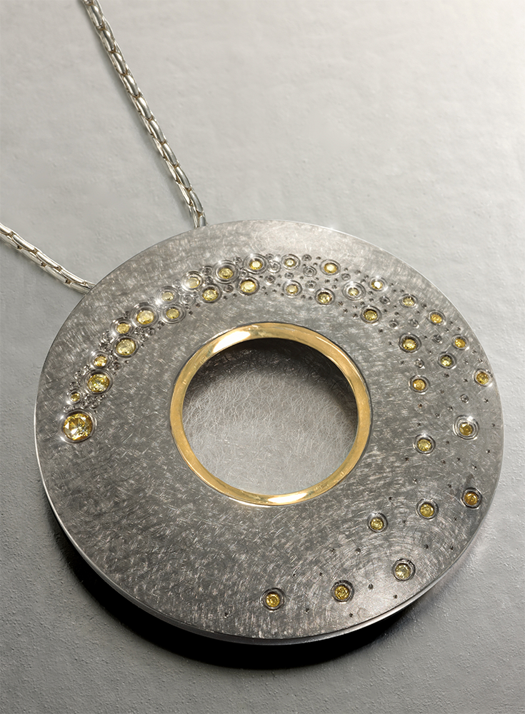 Silver, 18ct gold gilding finished in grey rhodium, set with natural yellow diamonds.