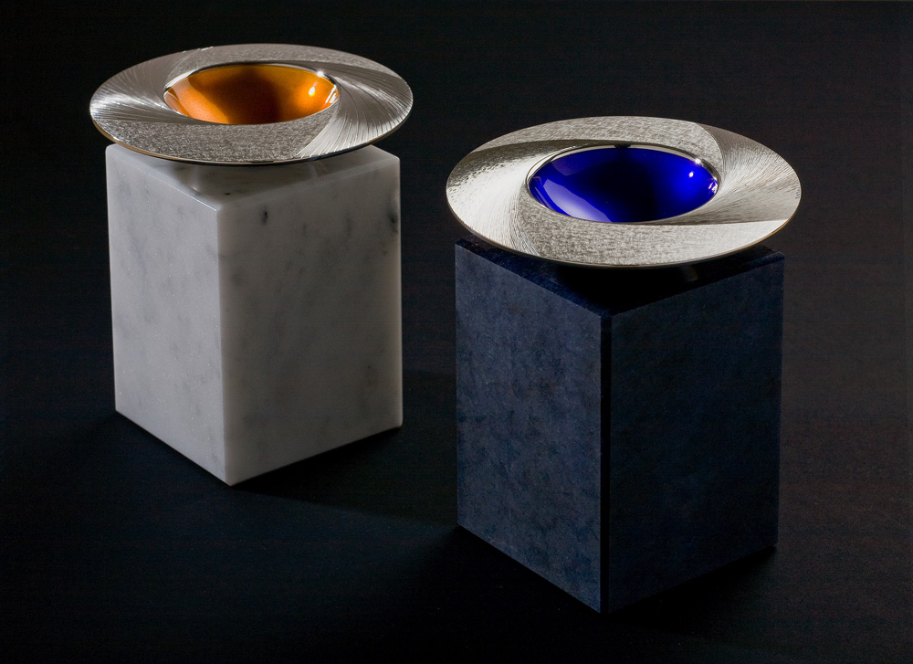 Midday and Midnight Bowls. Commission pieces 2009. 110 mm diam. Silver, hand engraved, yellow/orange and blue enamel respectively. Photo : Simon Armitt
