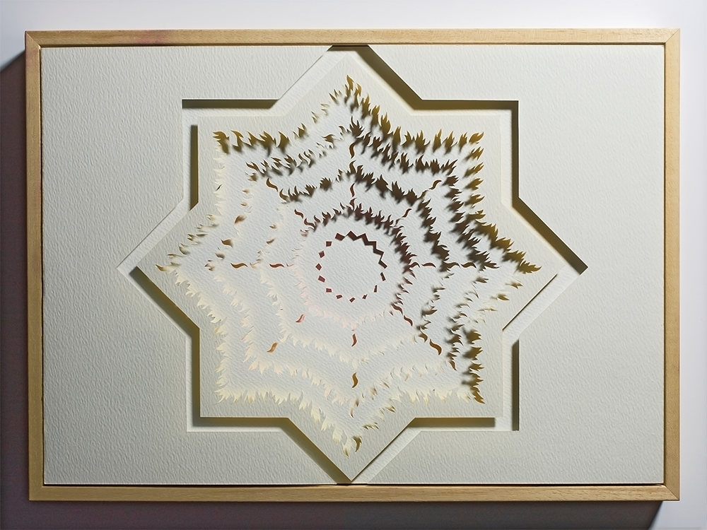 <a href="/jewellery/paper-cut-thoughts-eight-pointed-star-1-2010-watercolour-paper-board-crayon-and-wood-frame">Paper Cut - Thoughts on an Eight Pointed Star 1 - 2010. Watercolour paper, board, crayon and wood frame. Work A3. out/dim/cm 44 x 32 x 5, photo Simon B Armitt</a>