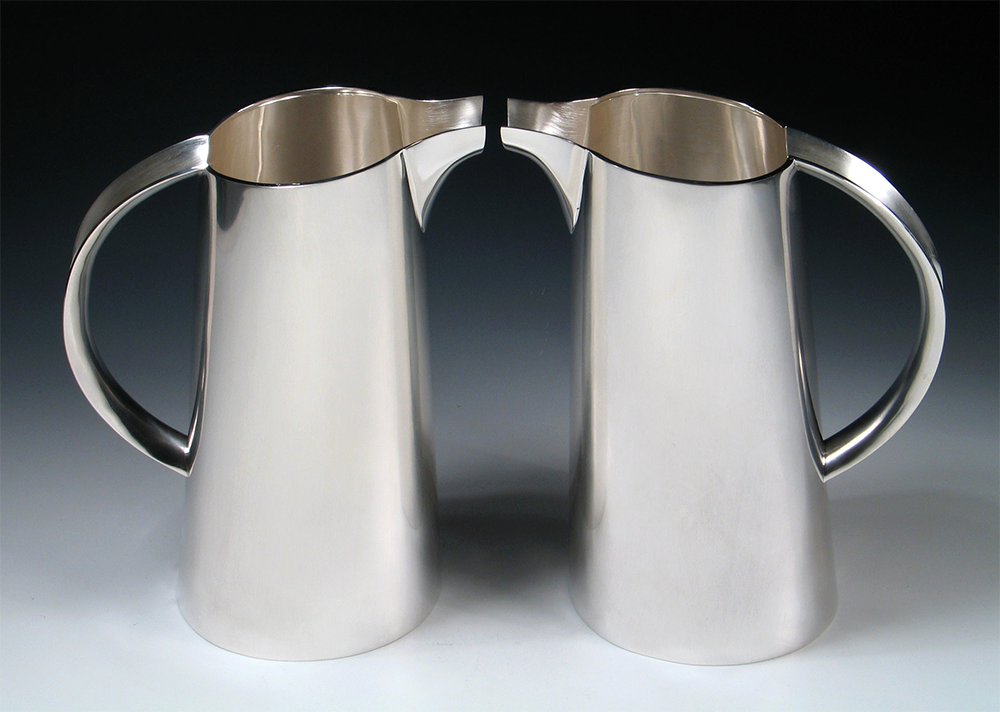 <a href="/jewellery/pair-water-jugs-commission-silver-photo-andra-nelki">Pair of water jugs. Commission, silver. Photo: Andra Nelki</a>